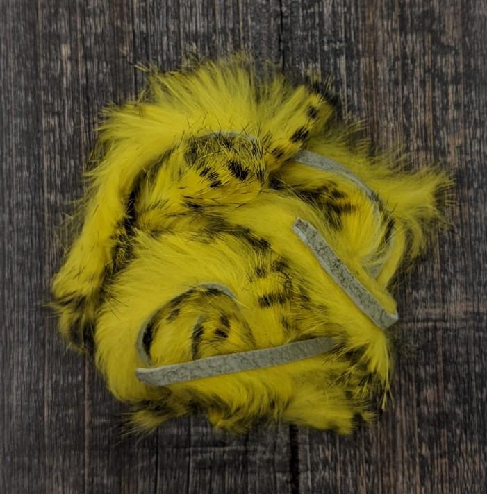 Hareline Dubbin Black Barred Rabbit Strip 1/8" Yellow Hair, Fur