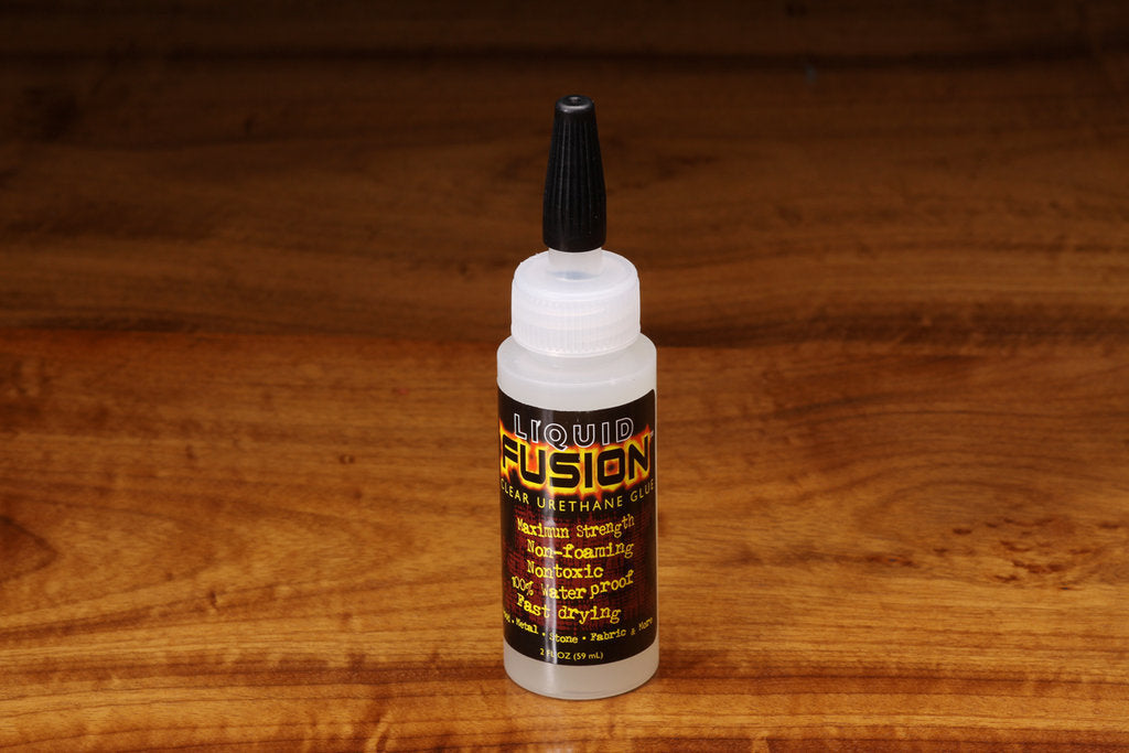 LIQUID FUSION ADHESIVE, NON TOXIC, DRIES CLEAR, WORKS on FABRIC