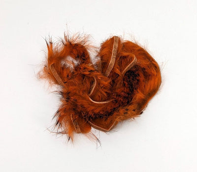 Hareline Dubbin Black Barred Rabbit Strip 1/8" Crawfish Orange Hair, Fur