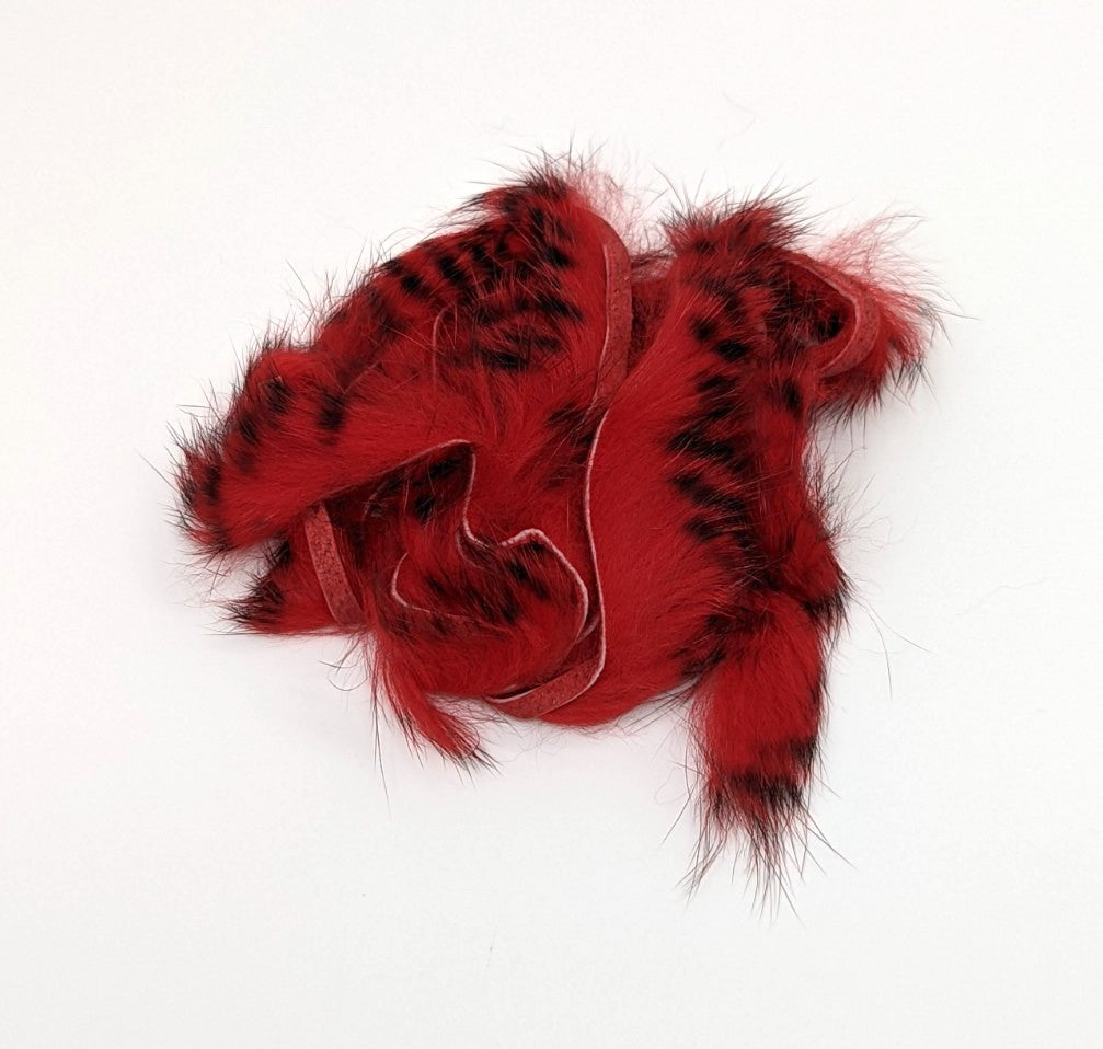 Hareline Dubbin Black Barred Rabbit Strip 1/8" Red Hair, Fur