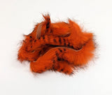 Hareline Dubbin Black Barred Rabbit Strip Magnum Hot Orange Hair, Fur