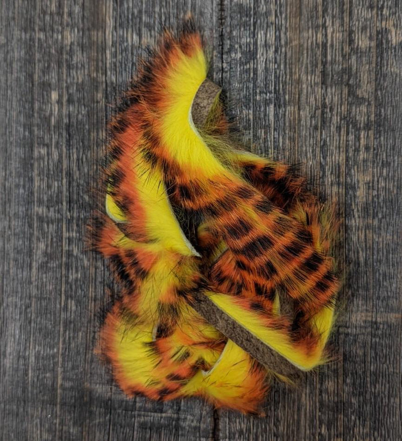Hareline Dubbin Magnum Tiger Barred Rabbit Strips Orange Black Over Yellow 