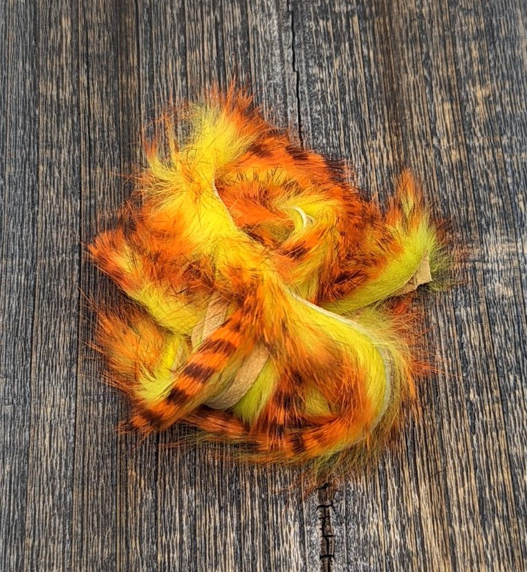 Hareline Dubbin Tiger Barred Rabbit Strips 1/8" Orange Black over Yellow Chartreuse Hair, Fur
