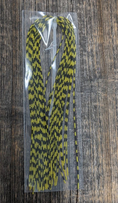Hareline Grizzly Barred Rubber Legs Fl. Yellow / Medium Rubber Legs