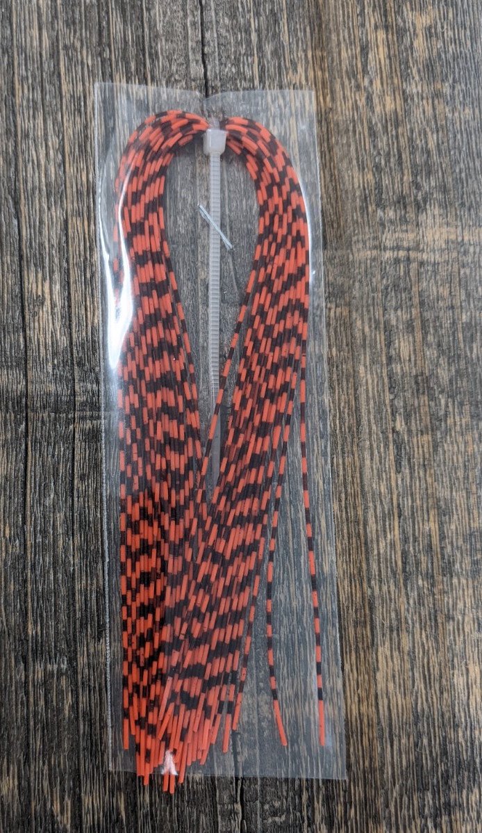 Hareline Grizzly Barred Rubber Legs Neon Orange / Medium Rubber Legs