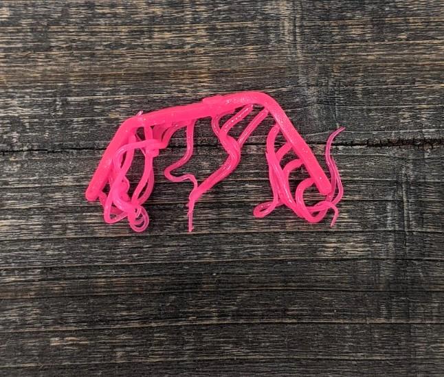 Hareline Mini Squiggle Worms #131 Fl Fuschia Legs, Wings, Tails